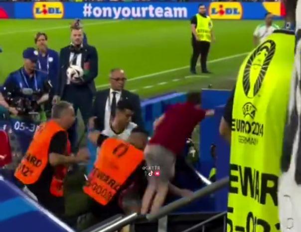 A fan fell on Ronaldo from the stands