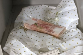 Иностранец пытался дать взятку через камеру хранения супермаркета в Приамурье