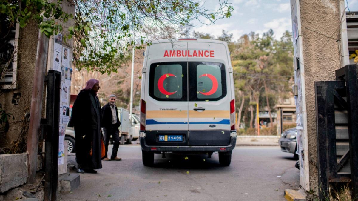 A booby-trapped car exploded outside a police station in Syria, killing people